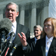 Attorney Bert Rein with plaintiff Abigail Noel Fisher after the U.S. Supreme Court heard arguments in her case Fisher v. University of Texas at Austin on Oct. 10, 2012, in Washington, D.C. (Mark Wilson/Getty Images)